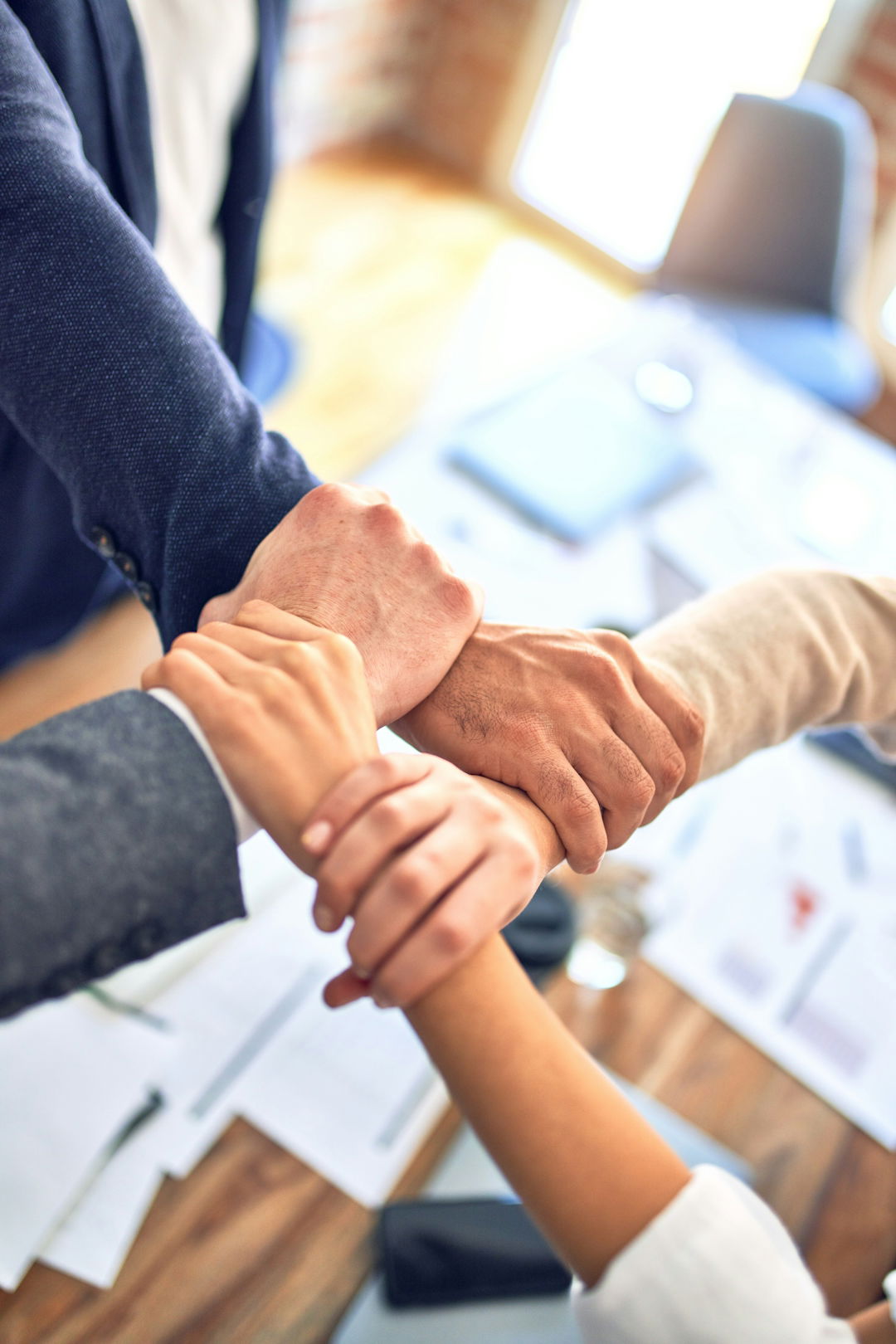 person-in-black-long-sleeve-shirt-holding-persons-hand.jpg person in black long sleeve shirt holding persons hand